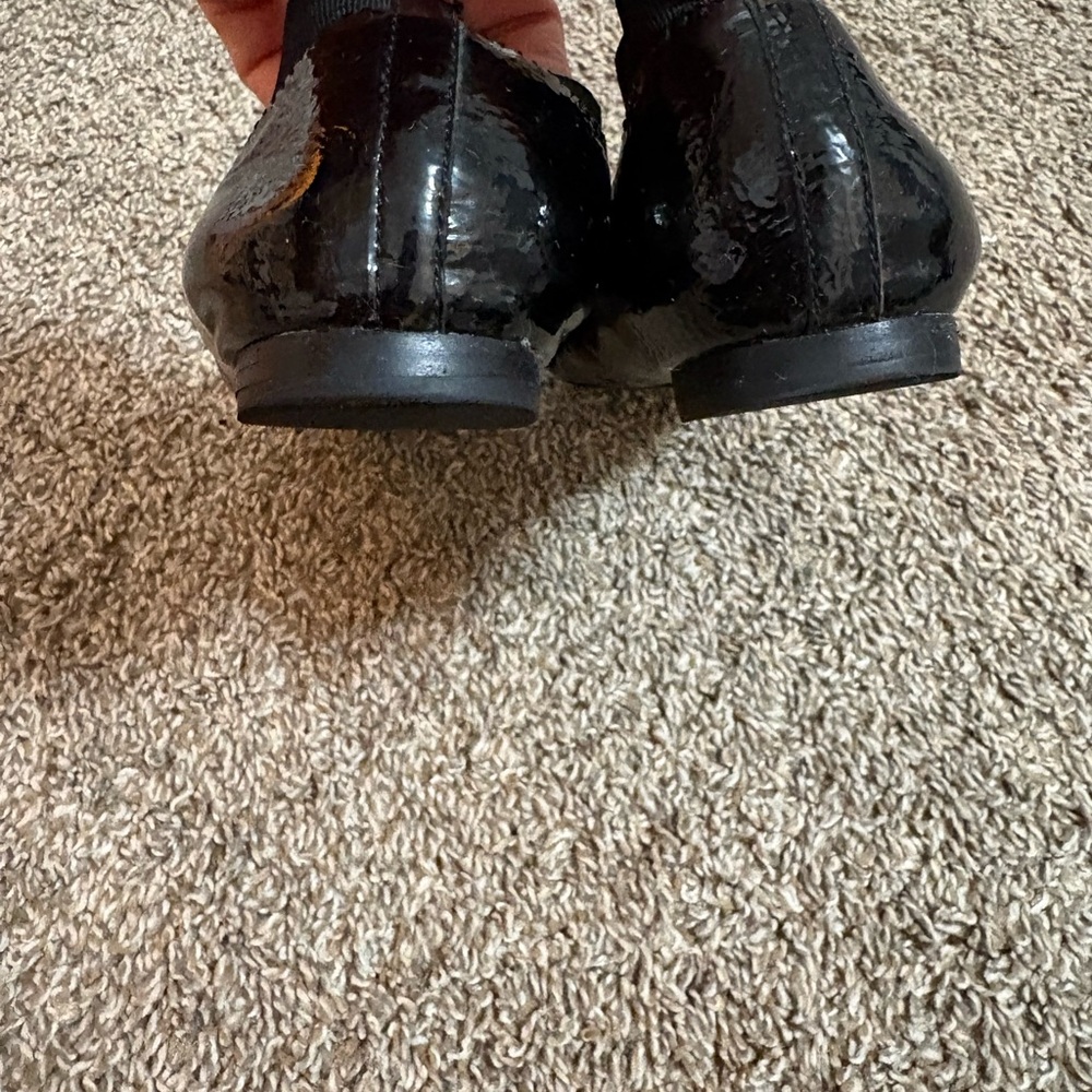 Tory Burch Shiny Black Flats with Gold Logo - Picture 6 of 9